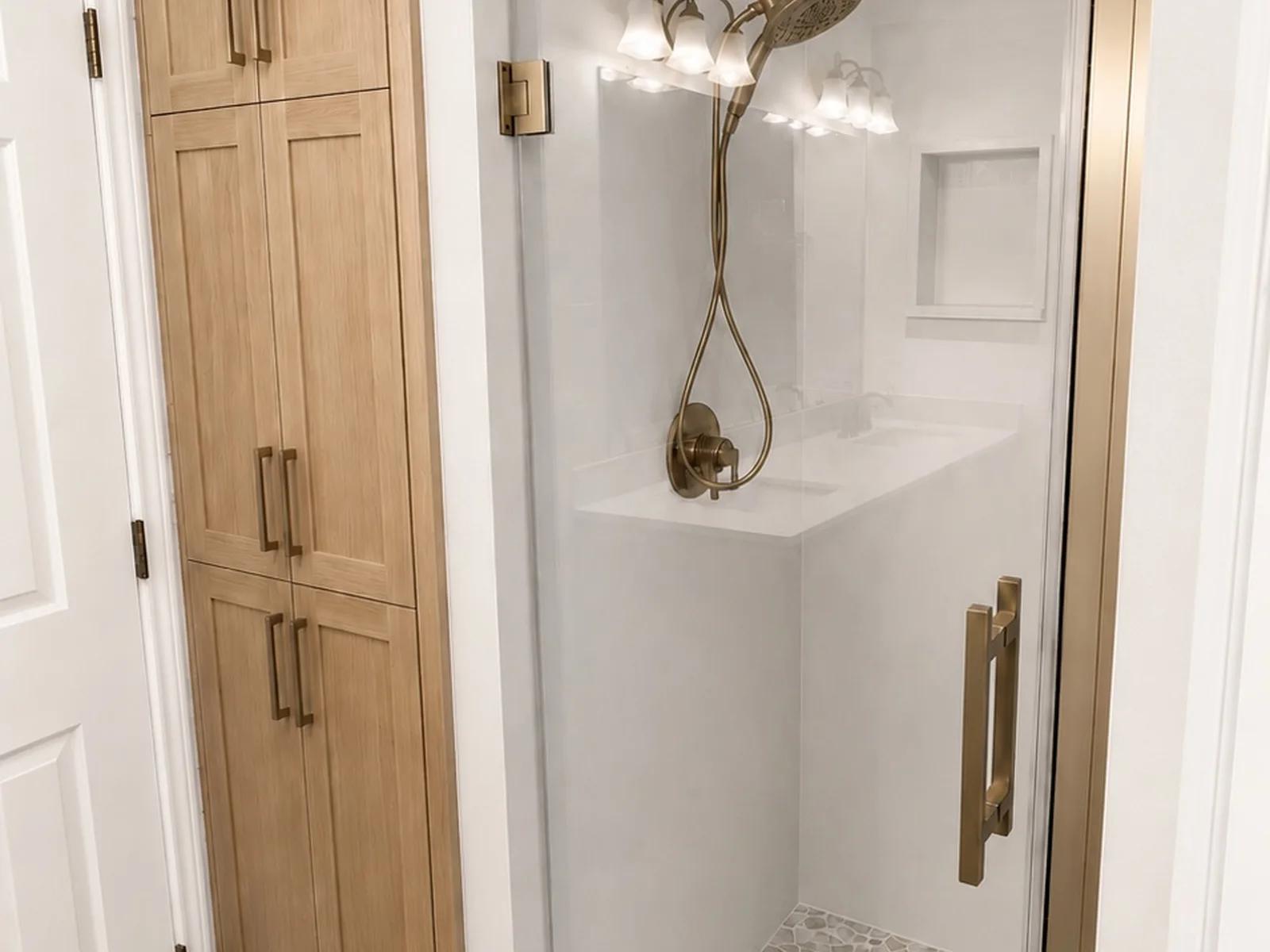 Shower remodel with specialty wall cabinetry