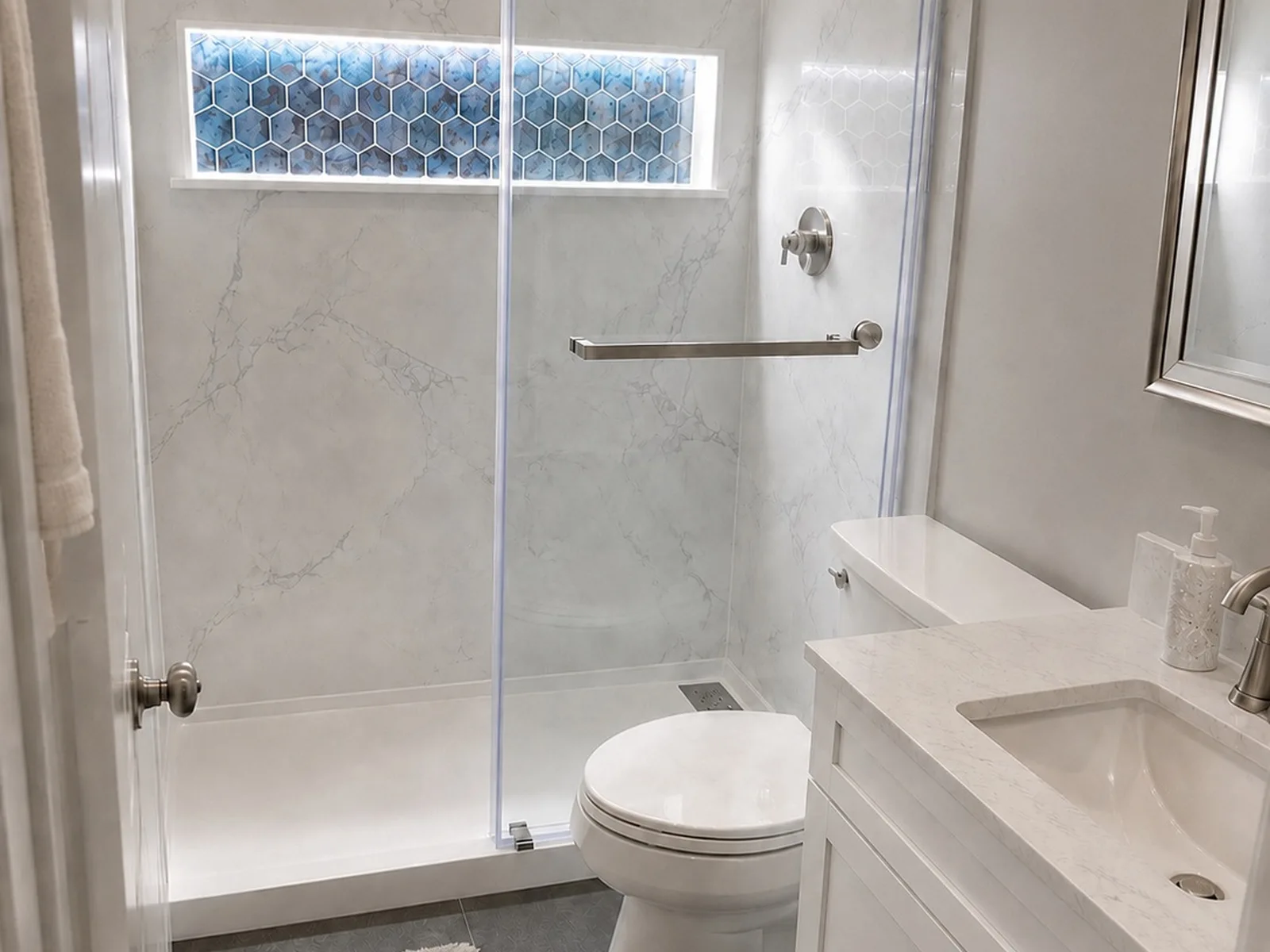 Tub-to-shower conversion with LED niche, vanity and flooring