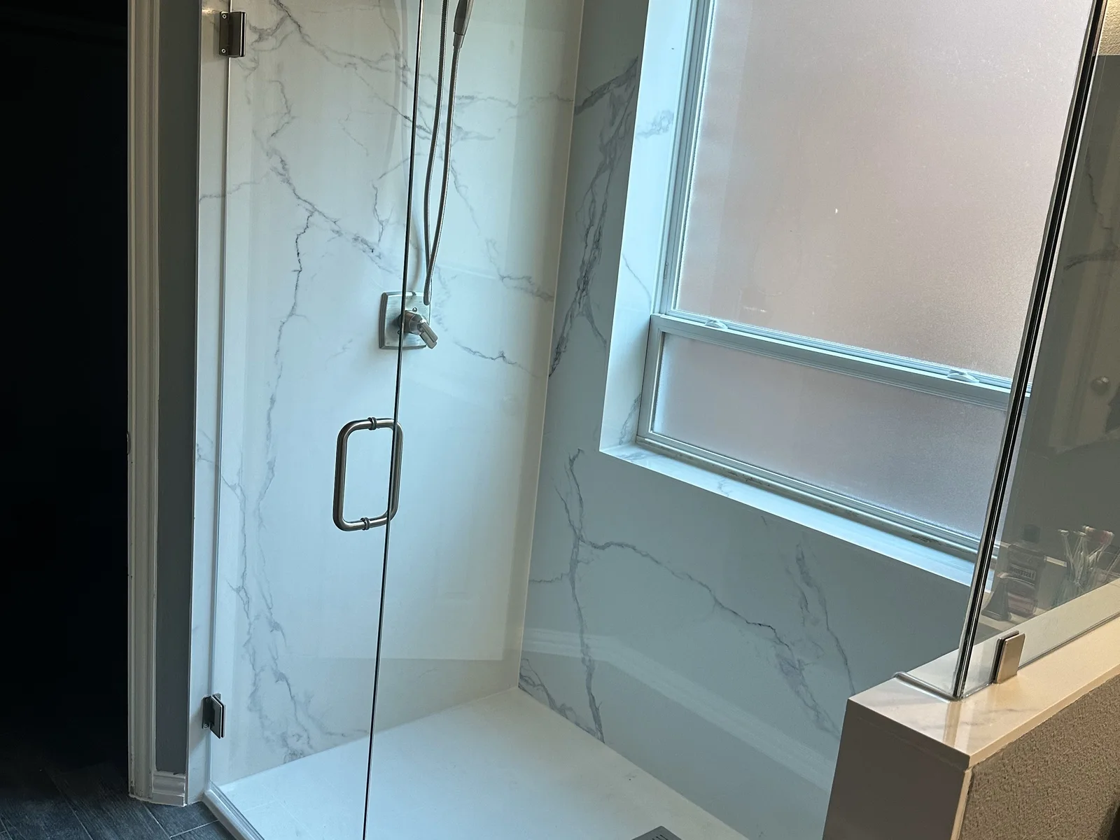 Low-barrier walk-in shower remodel
