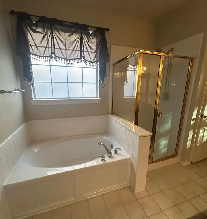 Walk-In Showers Before by All American Home Renovators