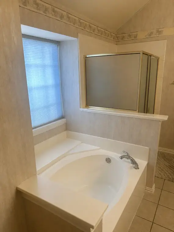 Walk-In Showers Before by All American Home Renovators