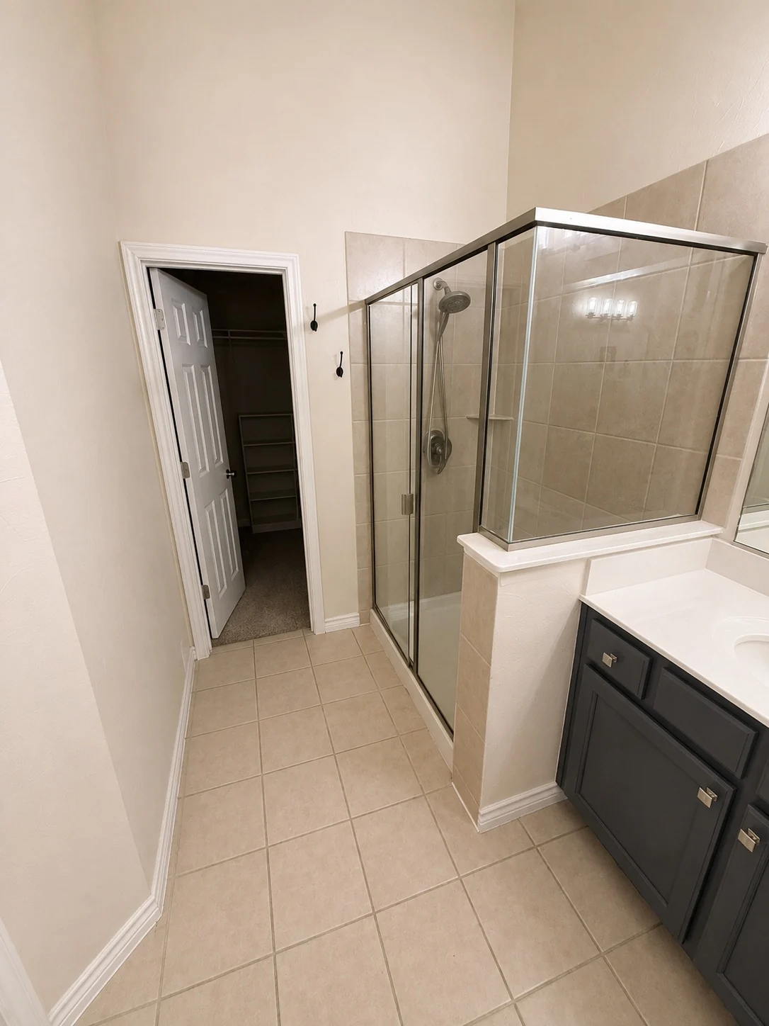 Original enclosed shower before primary bathroom renovation