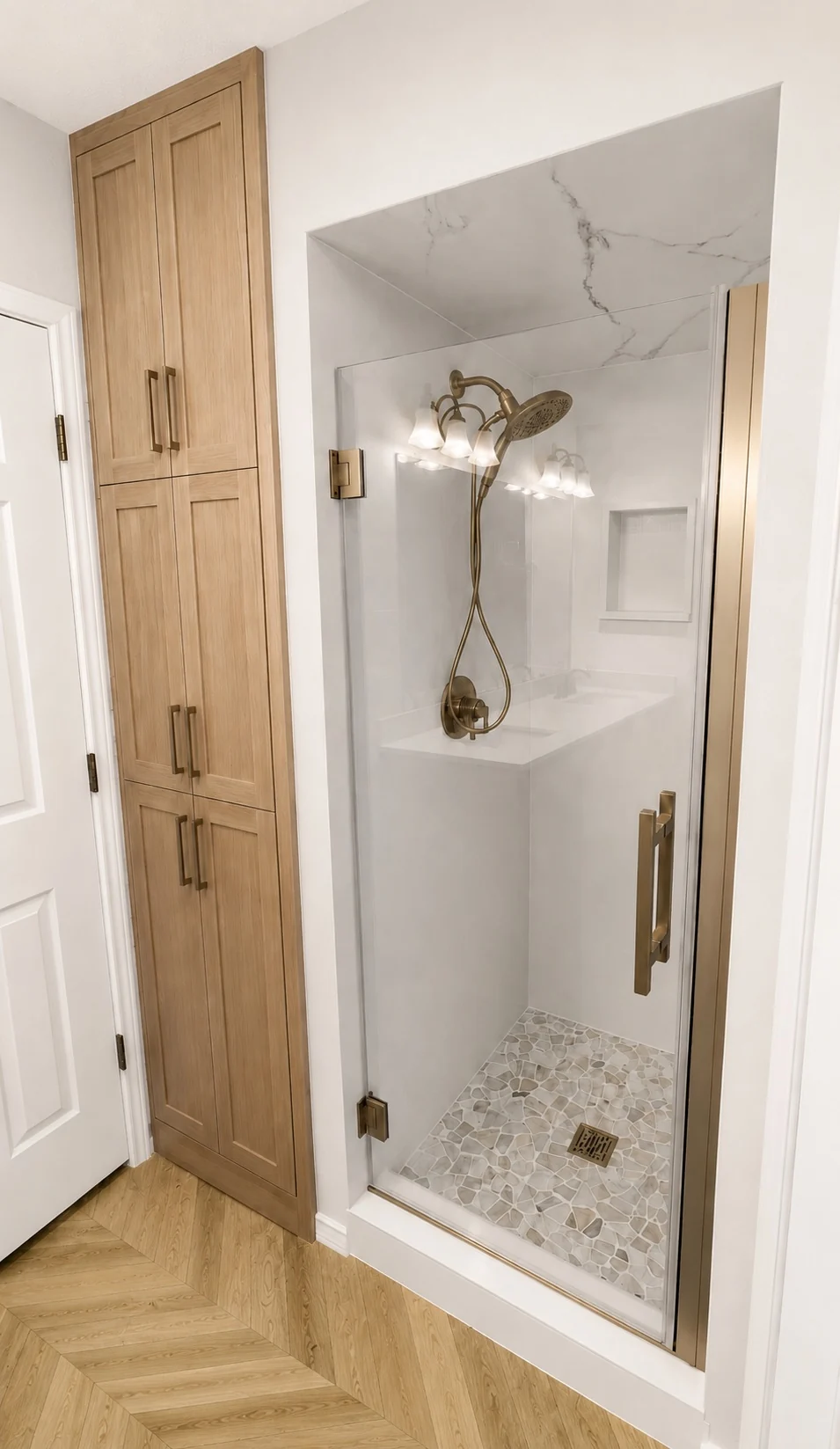 Completed shower remodel with integrated cabinetry and storage