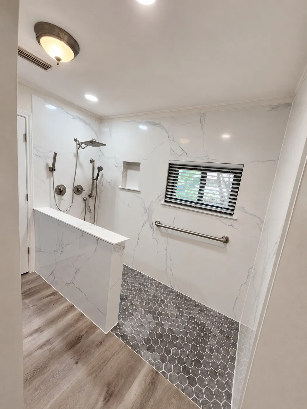 Zero-entry showers, seats, grab bars, handheld systems and wider access.
